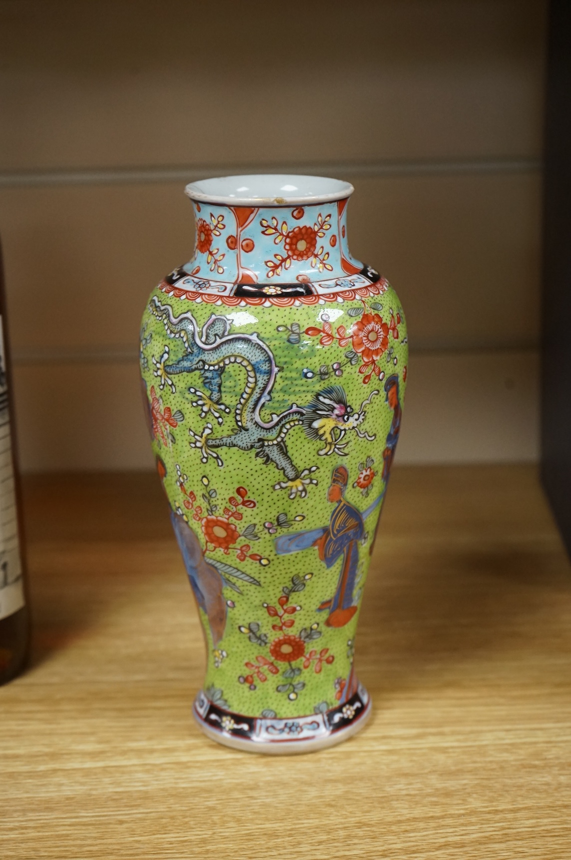 An 18th century Chinese clobbered vase, 20cm high